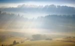 Sunlight Rays In The Alps Stock Photo