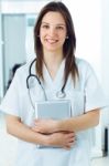 Cheerful Young Doctor Looking At The Camera Stock Photo