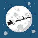 Santa Claus And His Reindeer Sleigh In Silhouette Against Moon Stock Photo