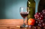 Glass Of Wine On Wooden Stock Photo