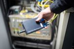 People Fix Node Fiber Optic In Network Room Stock Photo