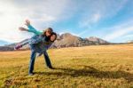 Mother Carries Daughter On Her Back  In Durmitor, Montenegro Stock Photo