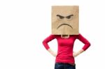 Angry Woman With Paper Bag On Head Stock Photo