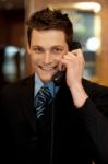 Businessman Talking Over Phone Stock Photo