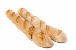 Traditional Baguette On White Background Stock Photo