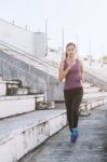 Women Runners Sprinting Outdoors. Healthy Lifestyle And Sport Co Stock Photo