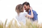 Loving Couple Under The Clear Sky Stock Photo