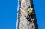 Horsted Keynes, Sussex/uk - October 8 : Steeplejack Working On T Stock Photo