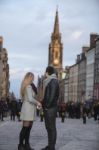 Attractive Young Couple On Royal Mile, Edinburgh Stock Photo