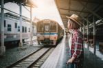 Pretty Woman Waiting The Train At Train Station For Travel In Su Stock Photo