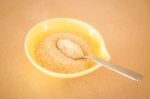 A Pile Of Brown Sugar In Little Bowl Stock Photo