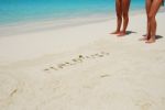 Maldives Written In A Sandy Tropical Beach Stock Photo