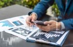 Handsome Businessman Wearing Suit And Using Modern Laptop Outdoo Stock Photo