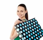 Smiling Lady Holding Shopping Bag Stock Photo