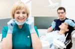 Dentist Treating His Patient Stock Photo