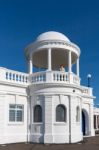 Woman Looking Out From A Colonnade At The De La Warr Pavilion Stock Photo