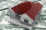 House On Dollar Background Stock Photo