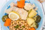 Codfish With Chickpeas And Vegetables Stock Photo