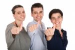 Brother And Sisters Showing Thumbs Up Stock Photo