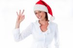 Woman With Santa Hat Stock Photo