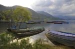  Wooden Boats On The Lake, Nepal Stock Photo