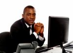 African Businessman With Computer Stock Photo