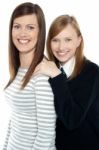 Daughter Resting Hands On Mothers Shoulders Stock Photo