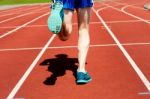 Runner Practicing On A Race Track Stock Photo