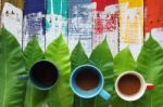 Coffee Cup On Colorful Creative Wooden Panels Stock Photo