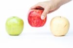 Three Different Kind Of Apples On White Background Stock Photo