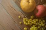 Apple On Wooden Floor Stock Photo