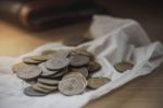 Coins On A Paper Stock Photo