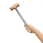 Human Hand Holding Hammer Stock Photo