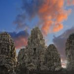 Ancient Stone Faces Of King Jayavarman Vii At The Bayon Temple, Stock Photo