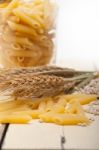 Italian Pasta Penne With Wheat Stock Photo