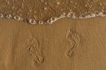 Footprints On Sand Stock Photo