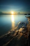 Seascape Sunsset With Fantastic Rock Surface Stock Photo