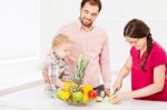 Family In Kitchen Stock Photo