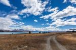 Track Running Alongside Lake Tekapo Stock Photo