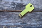 Key Usb Data Storage Isolated On Wooden Background Stock Photo