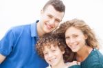 Happy Family Smiling Together Stock Photo