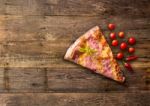 Diferents Types Of Pizza Cut On Wooden Table Stock Photo