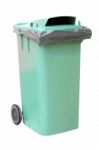 Green Plastic Waste Container On White Background Stock Photo