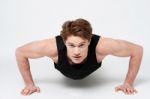 Young Sport Man Doing Exercises Stock Photo