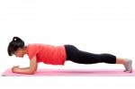 Woman Doing Plank Exercise Stock Photo