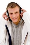 Cool Handsome Guy Enjoying Songs Stock Photo