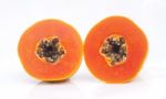 Papaya Fruit Sliced On Half Stock Photo