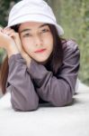 Thai Adult Girl White Cap Gray T-shirt Beautiful Girl Relax And Smile Stock Photo