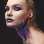 Portrait Of Beautiful Girl With Blue Tones Makeup Stock Photo