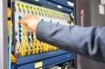 People Fix Node Fiber Optic In Network Room Stock Photo